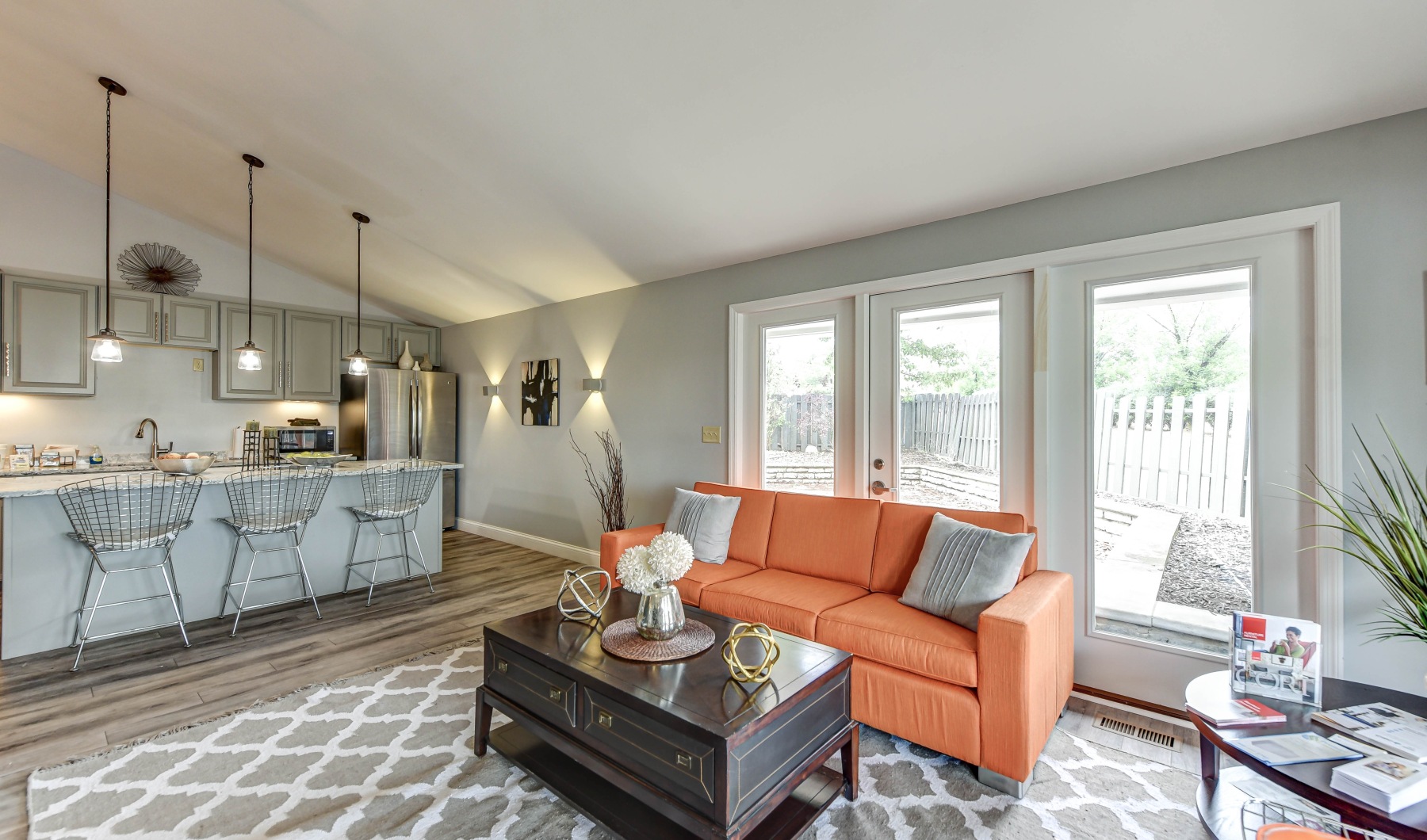 Clubhouse with kitchen and orange couch